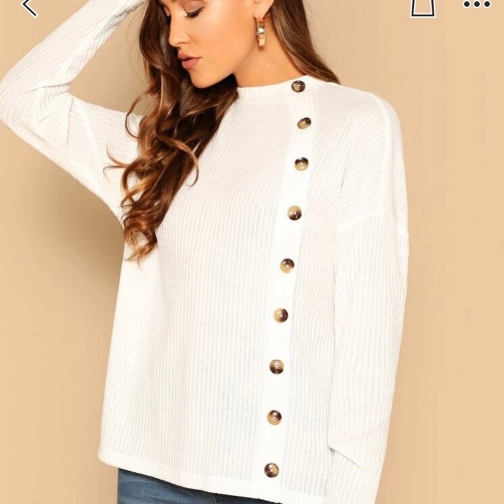White buttoned sweater